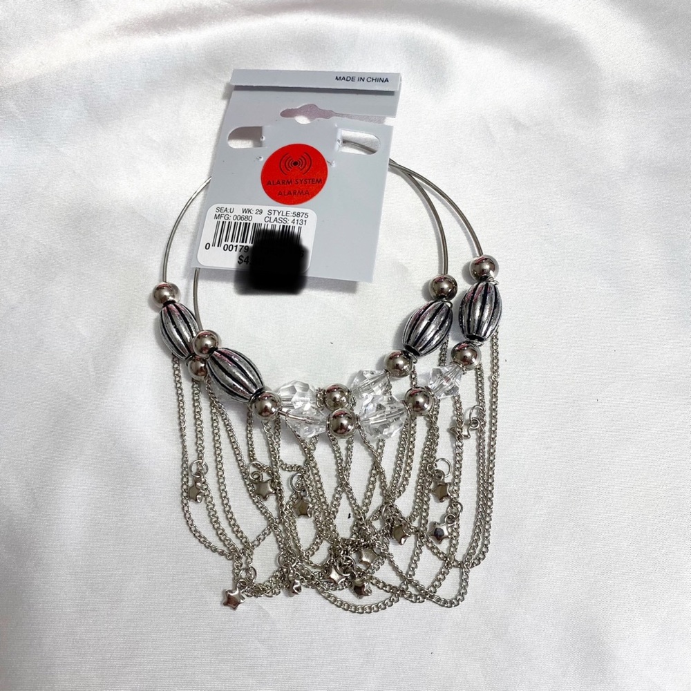 NWOT large silvertone hoop chandelier earrings dripping in chains and bling.